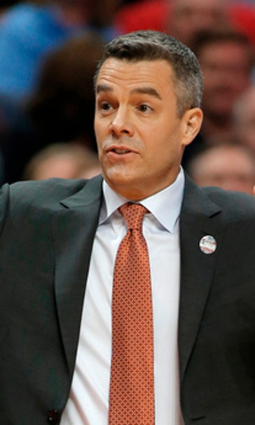 AP Interview: Virginia’s Bennett moving on from UMBC stunner